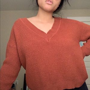 Rust colored autumnal deep v-neck sweater